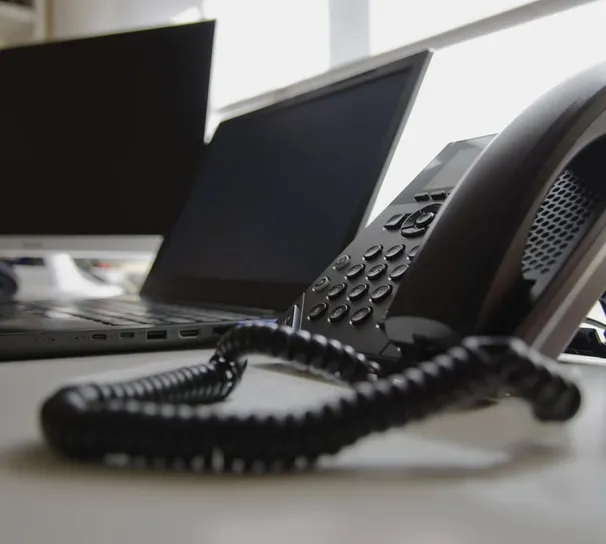 Business desk with phone and computer